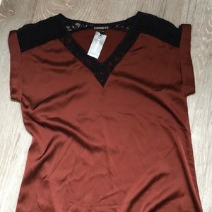 Express burnt orange silky too with lace accent